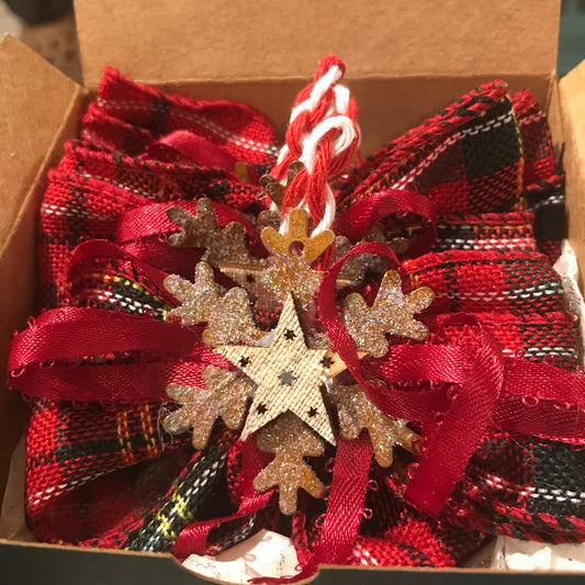 Red Plaid Bows with tin snowflake and wood star centerpieces
